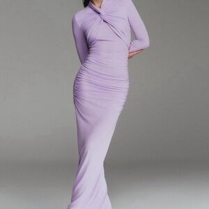 Carolina Herrera lilac long sleeve dress. Medium worn once! Exc cond. Elegance!
